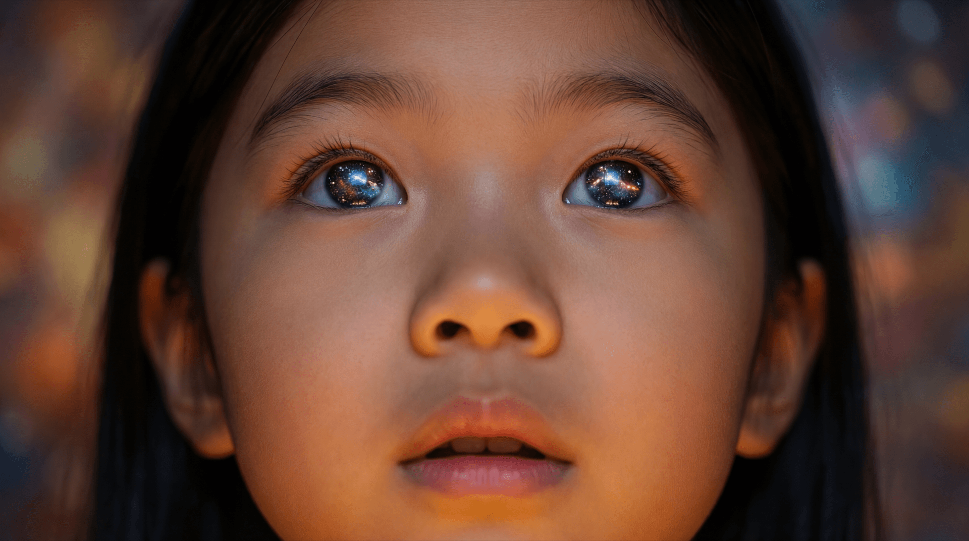 Close-up of girl's face lit by projected light from Luminary experience
